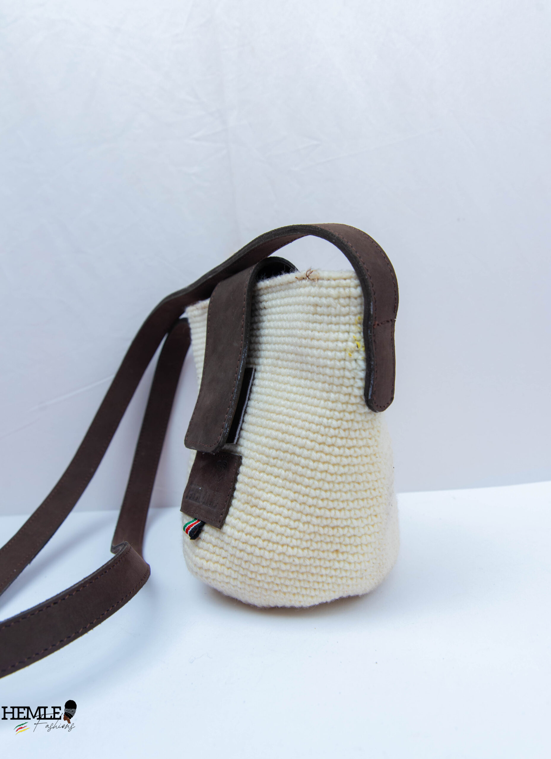 raffia crossbody bag with leather trim raffia crossbody bag with leather trim